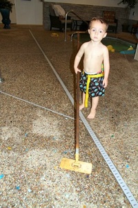 Adrienne's son... swimming and cleaning!