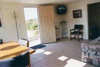 Dining and Living Area looking out Front Door