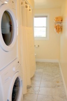 Full Bathroom with Tub Shower and Washer-Dryer